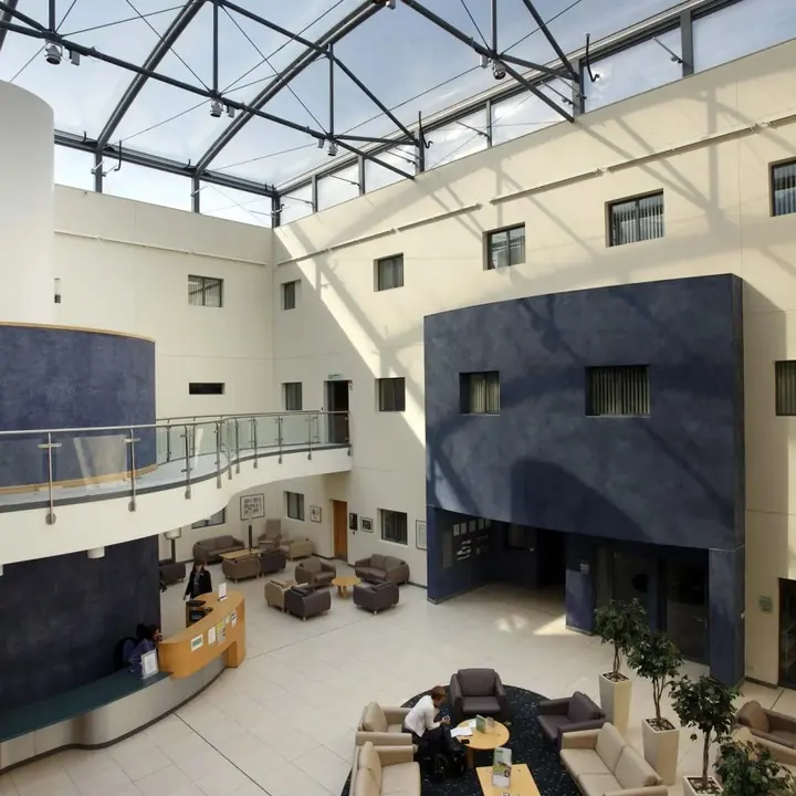 The naturally lit atrium and waiting area at the hospital.